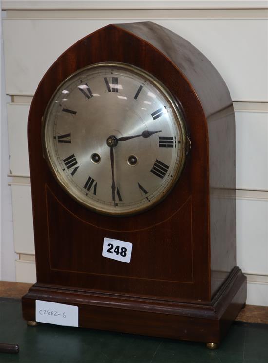 An Edwardian inlaid mahogany lancet top eight day mantel clock